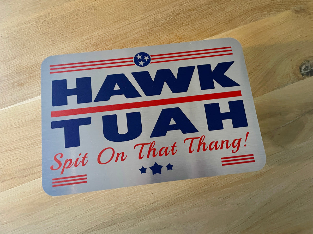 Bord Hawk Tuah ‘Spit on that thang’, aluminium, 20x30cm